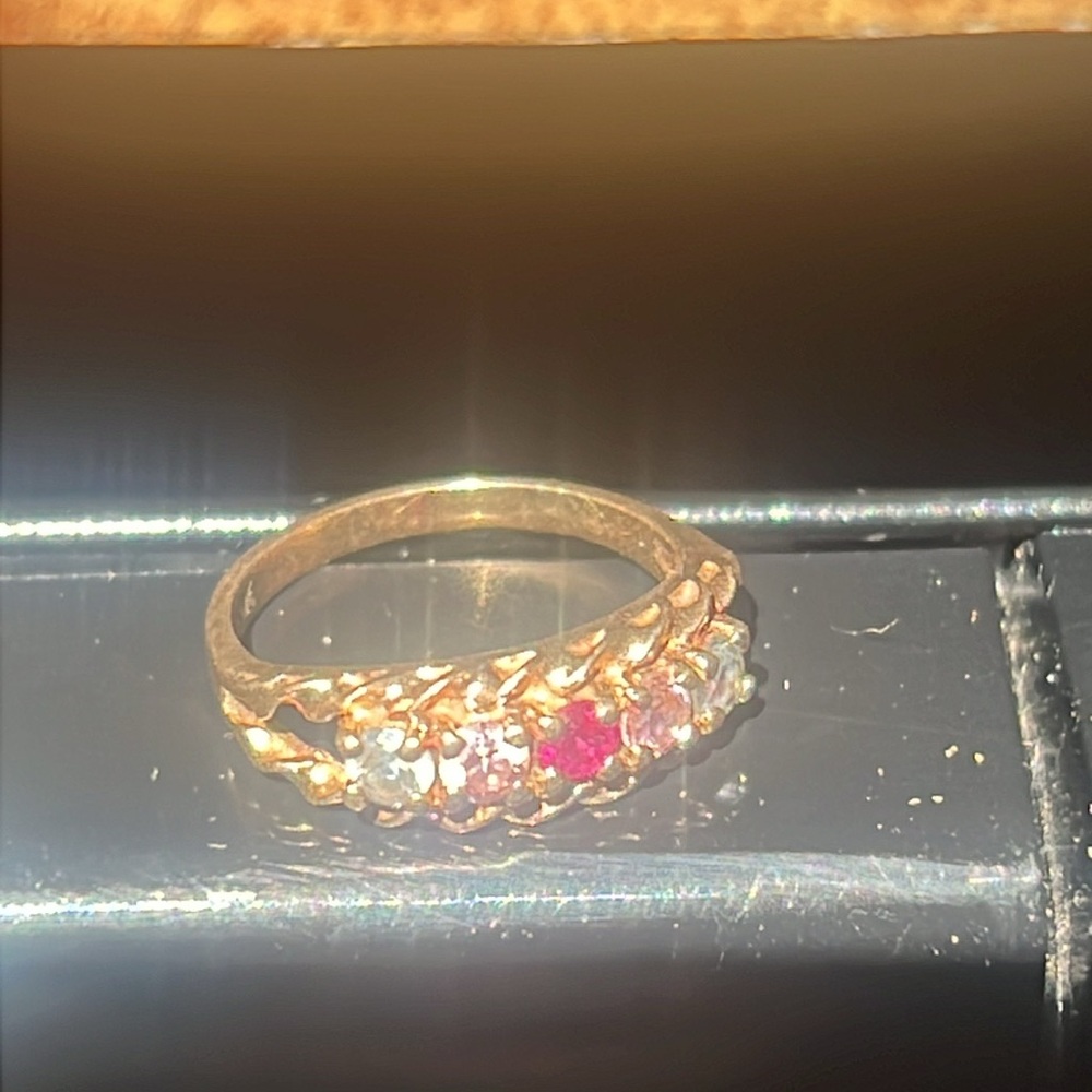 10k gold ring with aquamarine, pink topaz, and a ruby